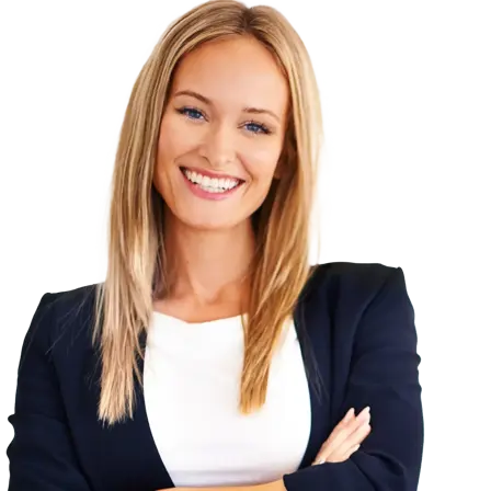 Woman with shoulder-length blonde hair wearing a white top and dark blue blazer, arms crossed over chest.